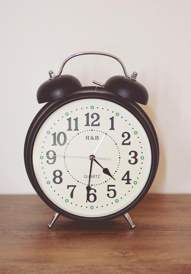 Select all of the items that would have a greater area than the circular clock face.