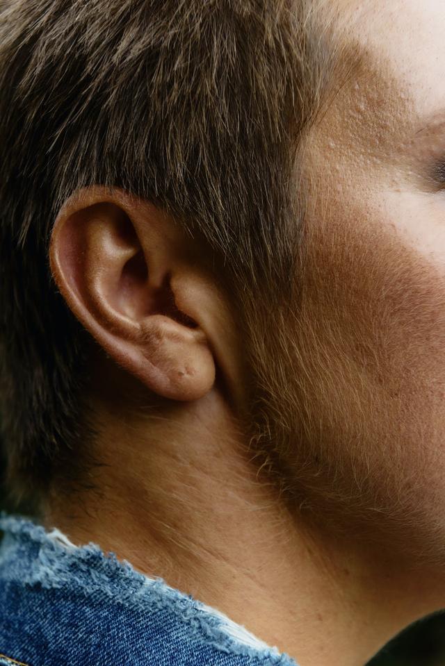 How does sound travel to a person's ears?