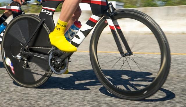 A bike wheel turning around is an example of which type of motion?