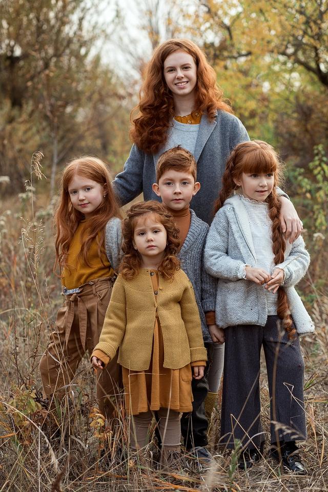 This is an image of siblings. They are all offspring of the same parents. Why do they look similar but not identical?
