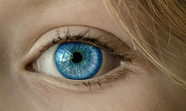 Order the statements to explain how genes cause the iris of a human eye to have colour.