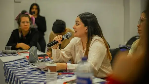 Why do scientists hold debates?