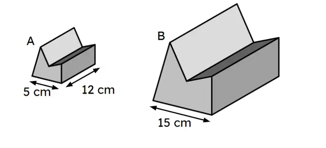 Prism A and prism B are similar. The end face of prism A has an area of 20 cm². The volume of prism B is <span class="blank">______</span> cm³.
