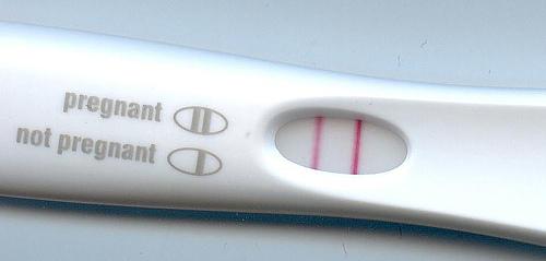 In a pregnancy test what is the monoclonal antibody attaching to?