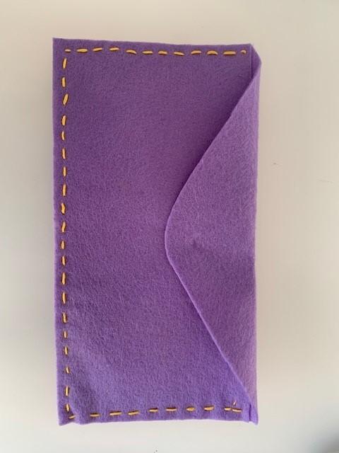 Why do the stitches on a stationery storage product need to be small and evenly spaced?